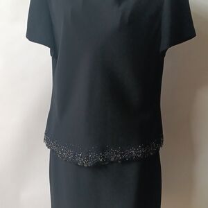 Elegant Black Dress with Beaded Hem